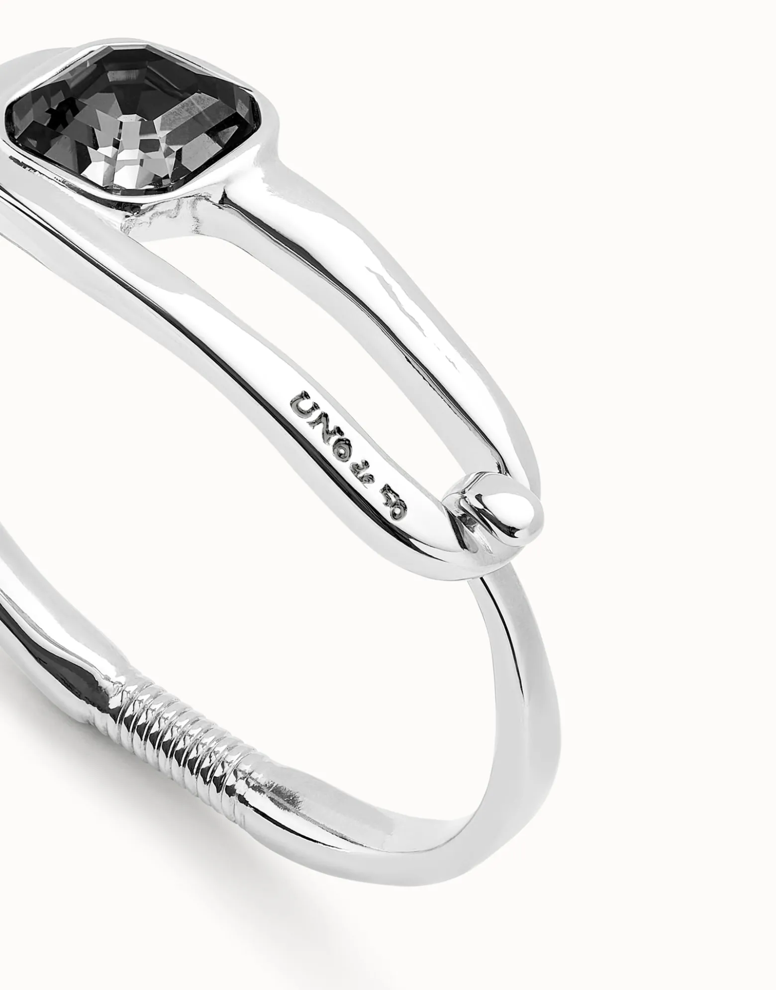 Bangle bracelet with a black crystal