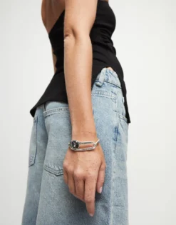 Bangle bracelet with a black crystal