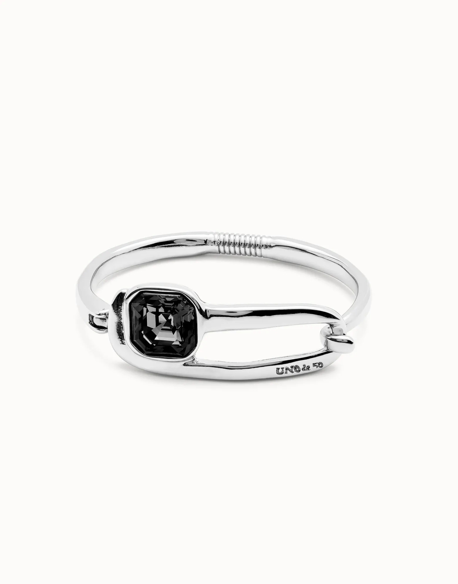 Bangle bracelet with a black crystal