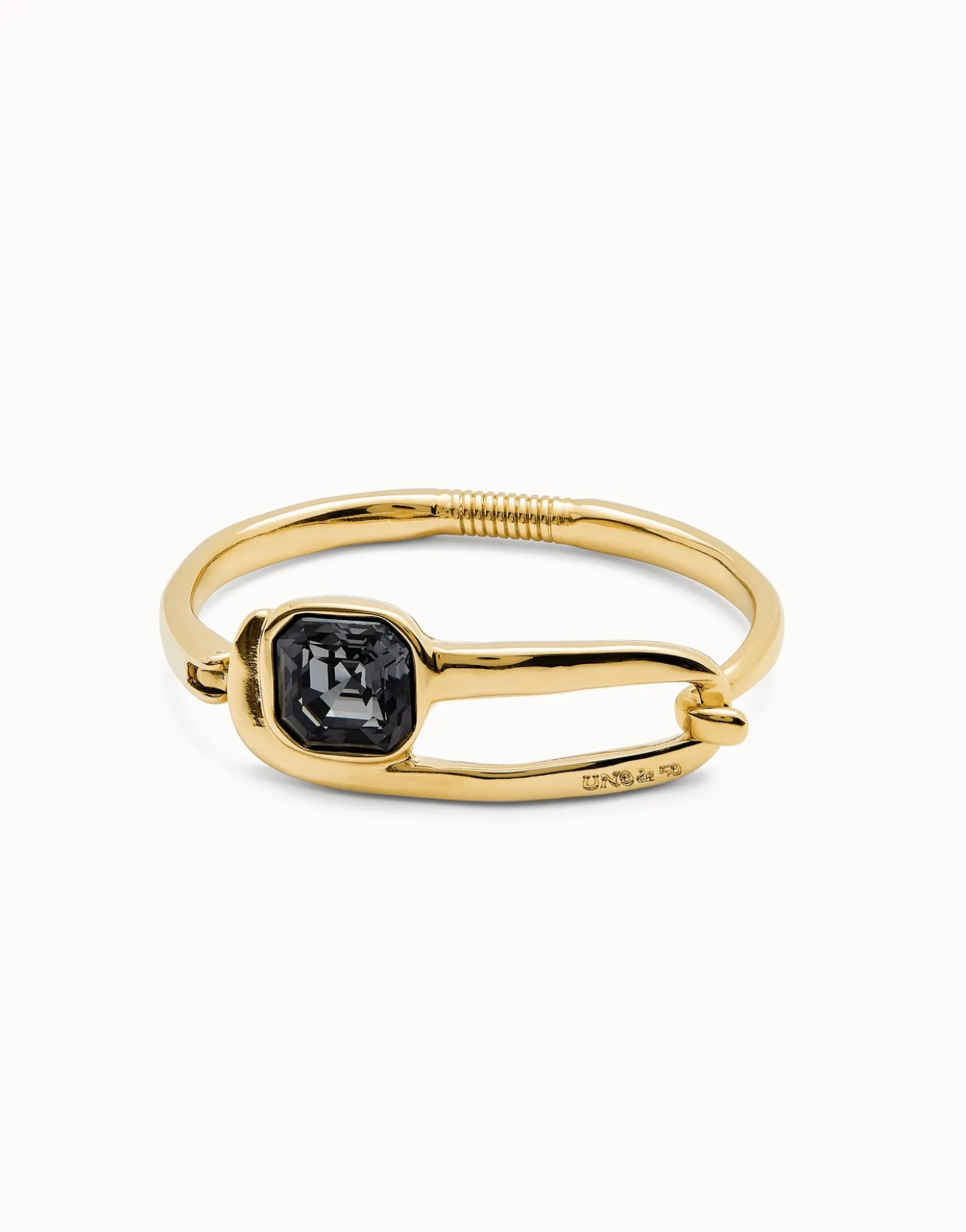 Bangle bracelet with a black crystal