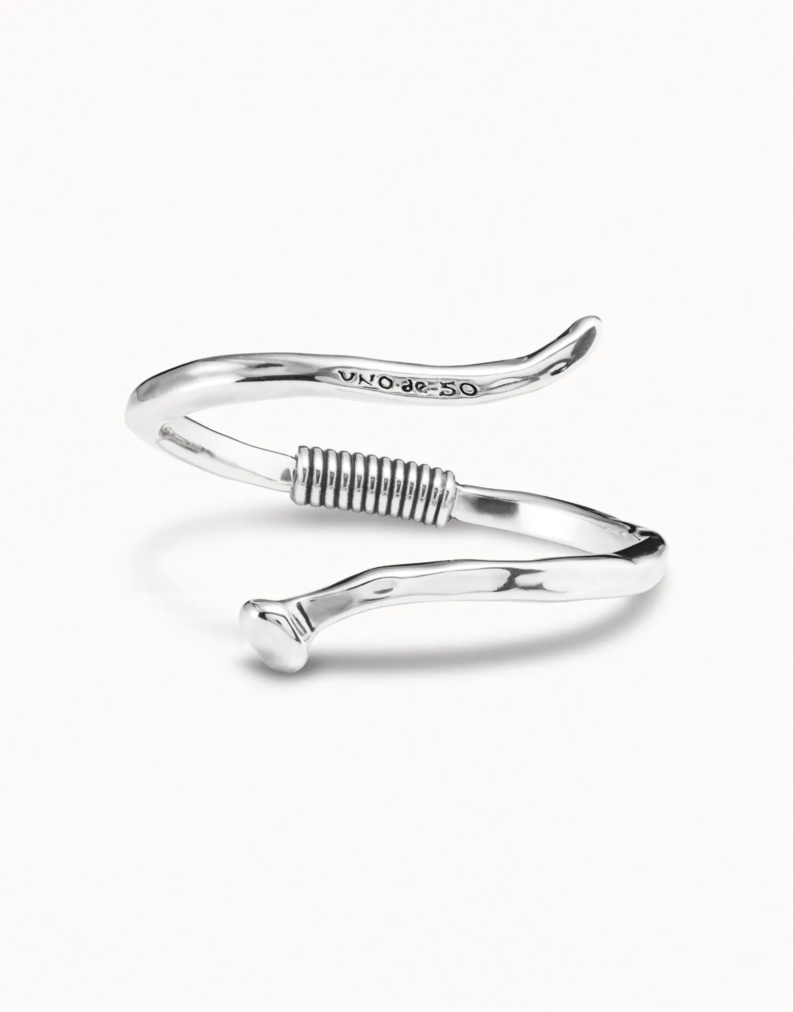 Bangle bracelet with a spiral-shaped nail
