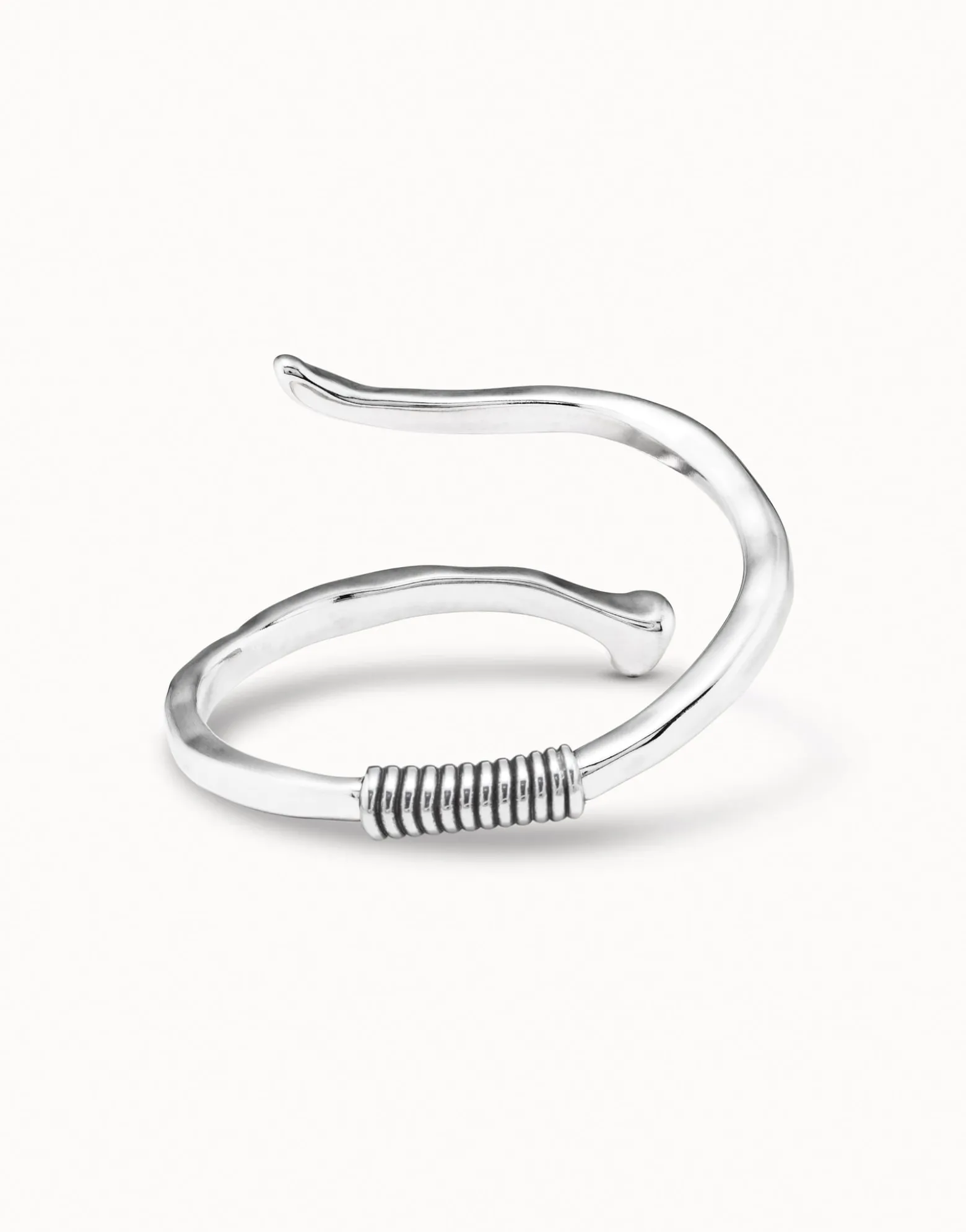 Bangle bracelet with a spiral-shaped nail