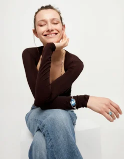 Bangle bracelet with faceted blue crystal