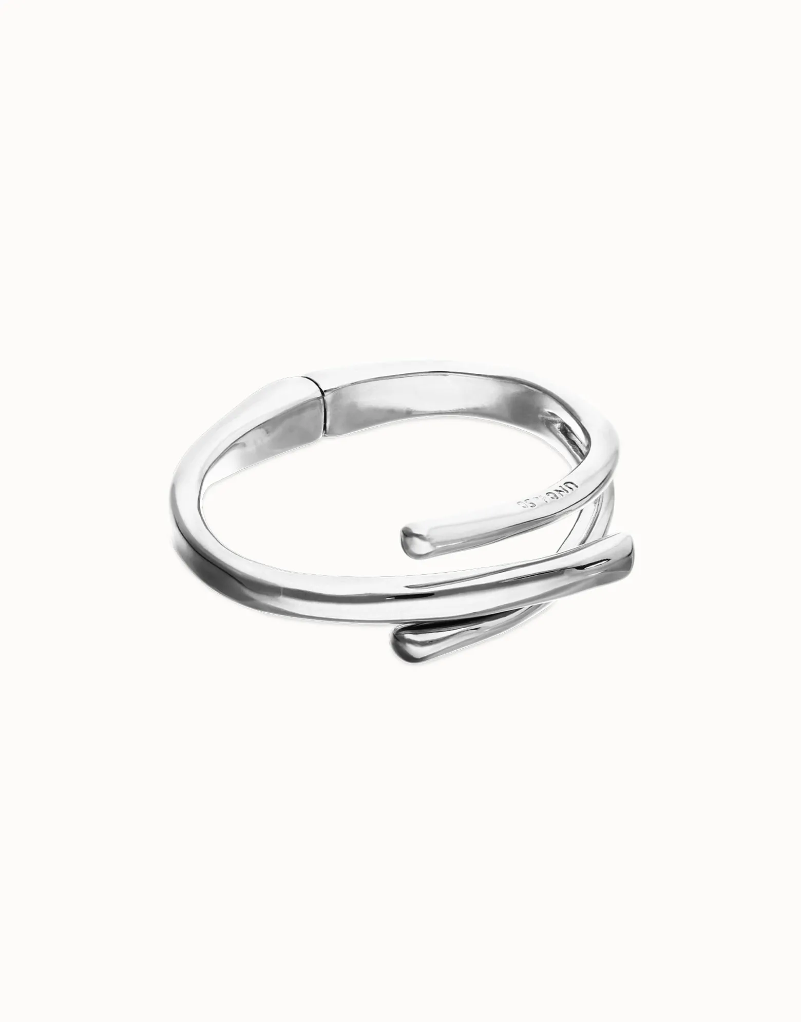 Bangle bracelet with three intertwined organic shapes