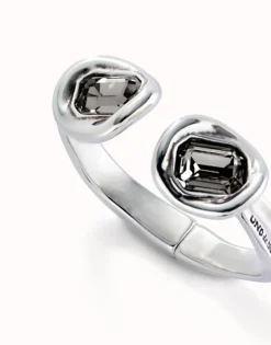 Bangle bracelet with two grey crystals