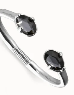Bangle bracelet with two oval faceted black crystals