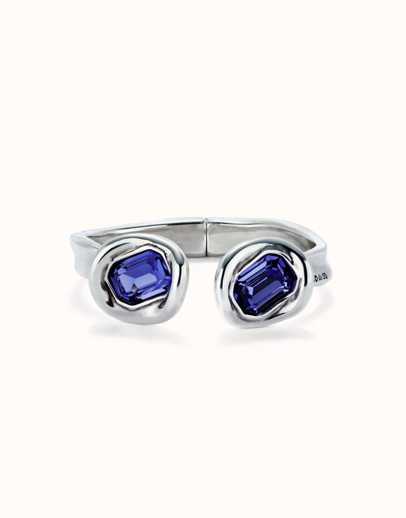 Bangle bracelet with two purple crystals