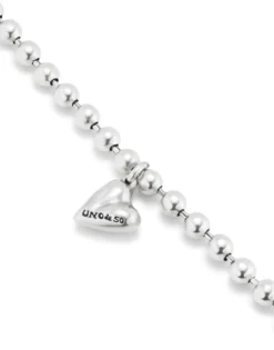 Beaded bracelet with a heart charm