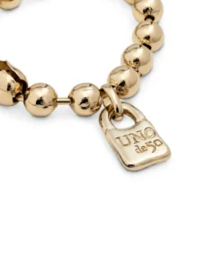 Beaded bracelet with a padlock charm