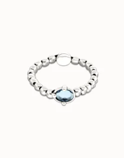 Beaded bracelet with blue oval faceted crystal