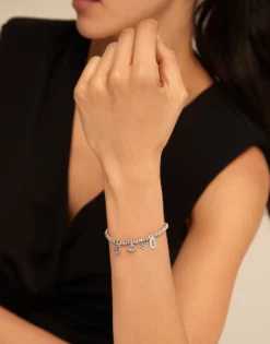 Beaded bracelet with charms