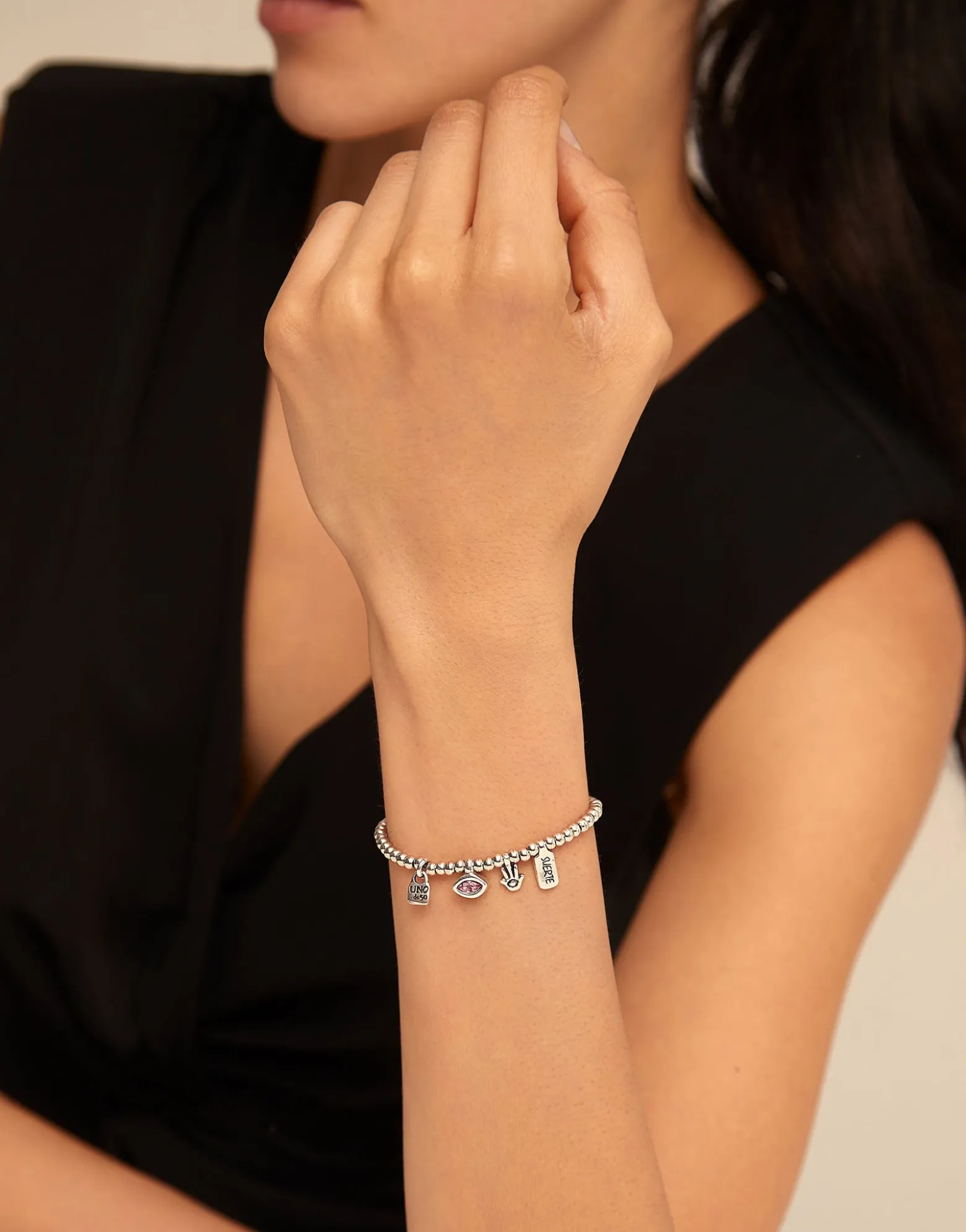 Beaded bracelet with charms