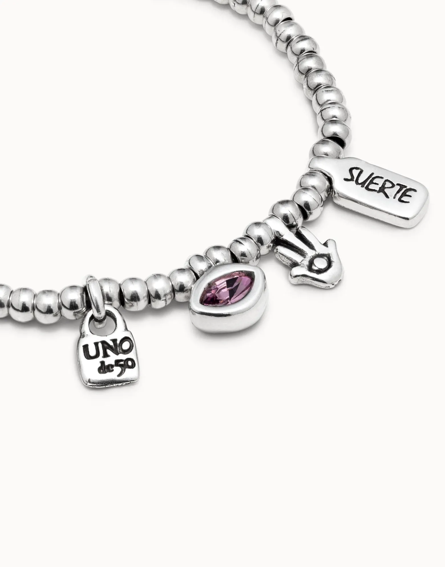 Beaded bracelet with charms