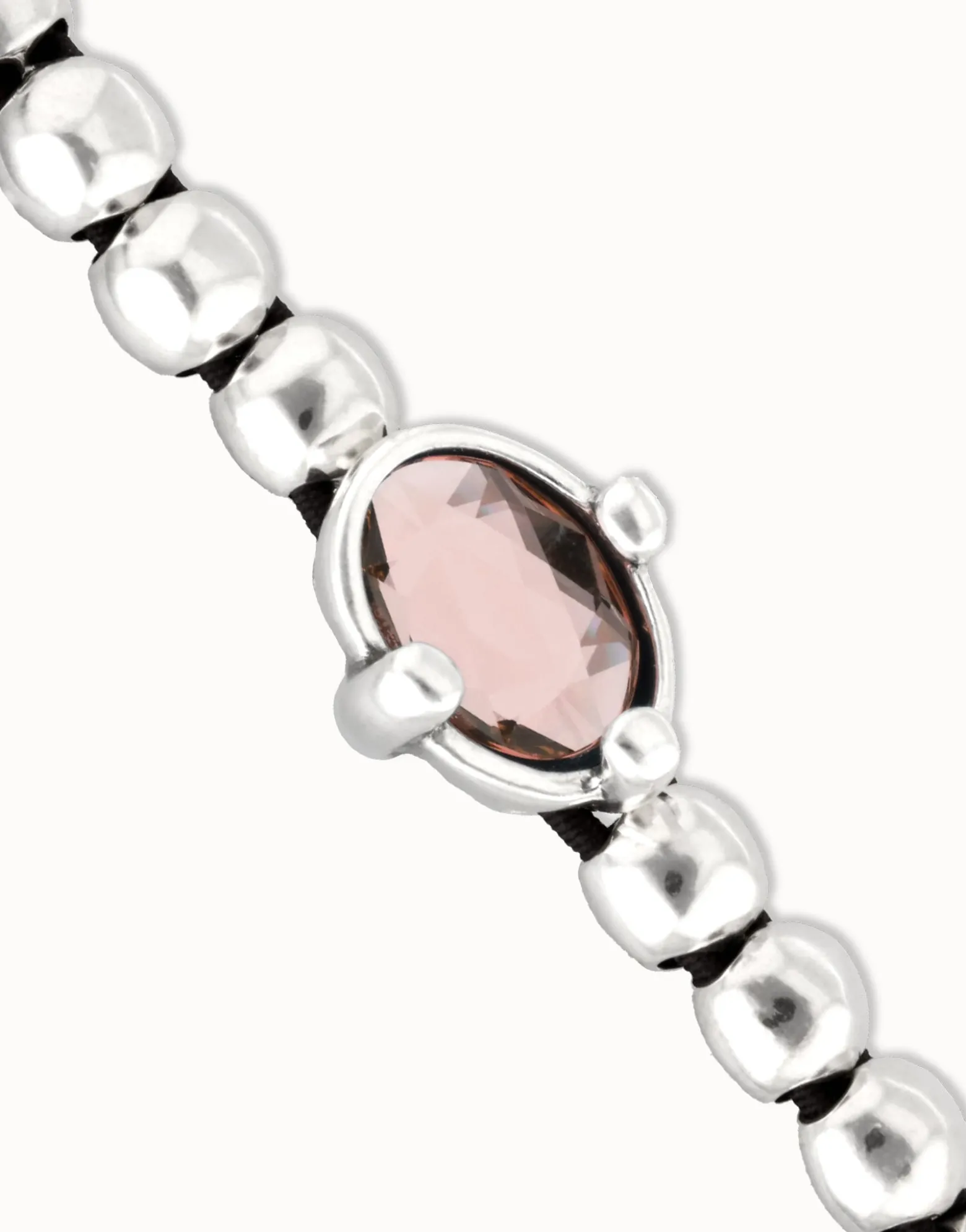 Beaded bracelet with pink oval faceted crystal