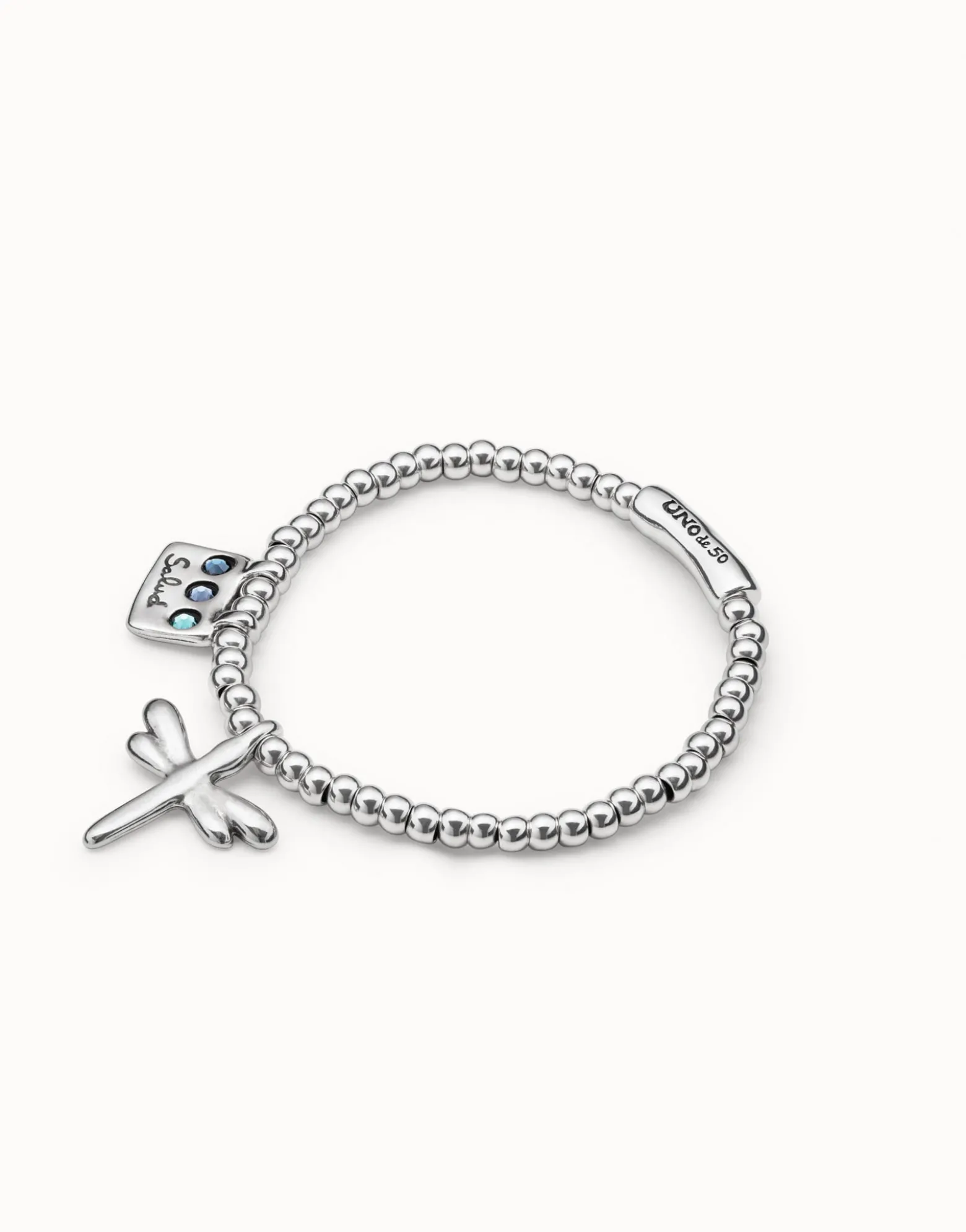 Beaded stretch bracelet with a dragonfly charm