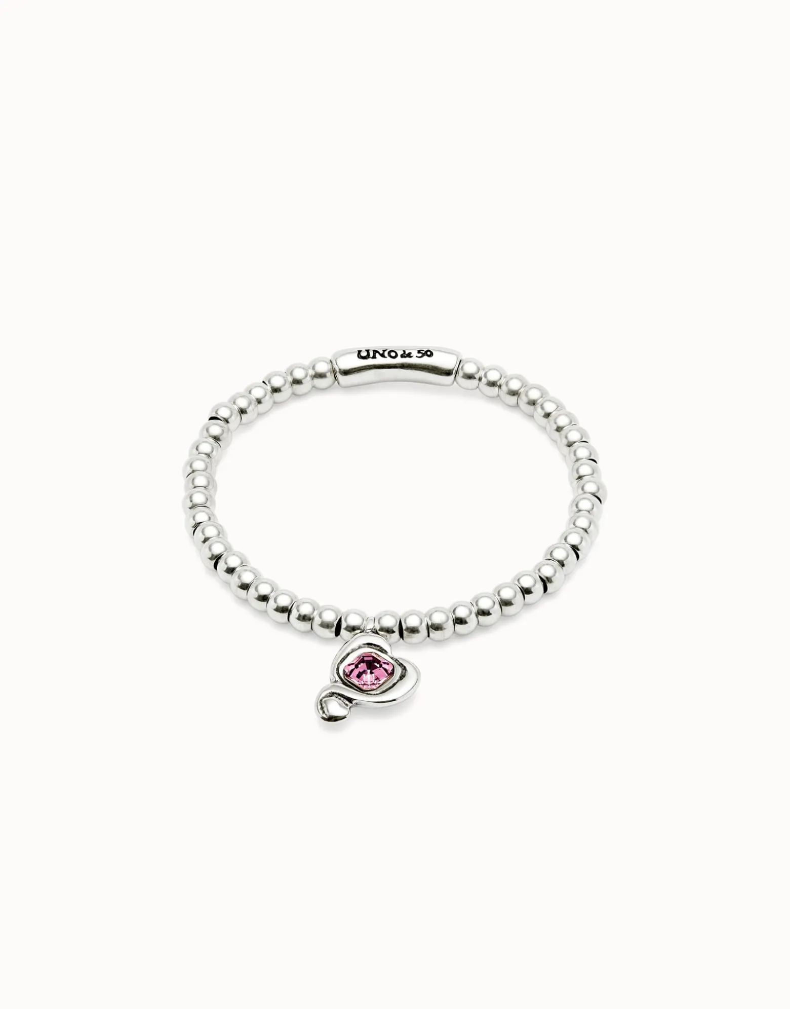Beaded stretch bracelet with heart and pink crystal