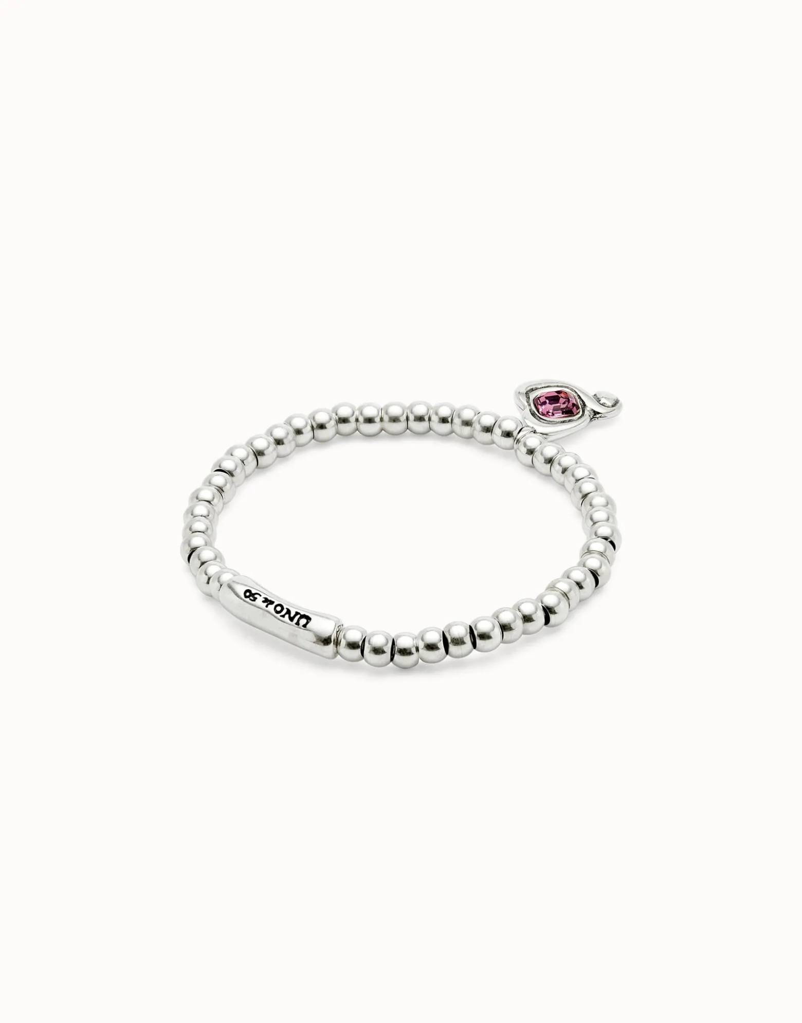Beaded stretch bracelet with heart and pink crystal