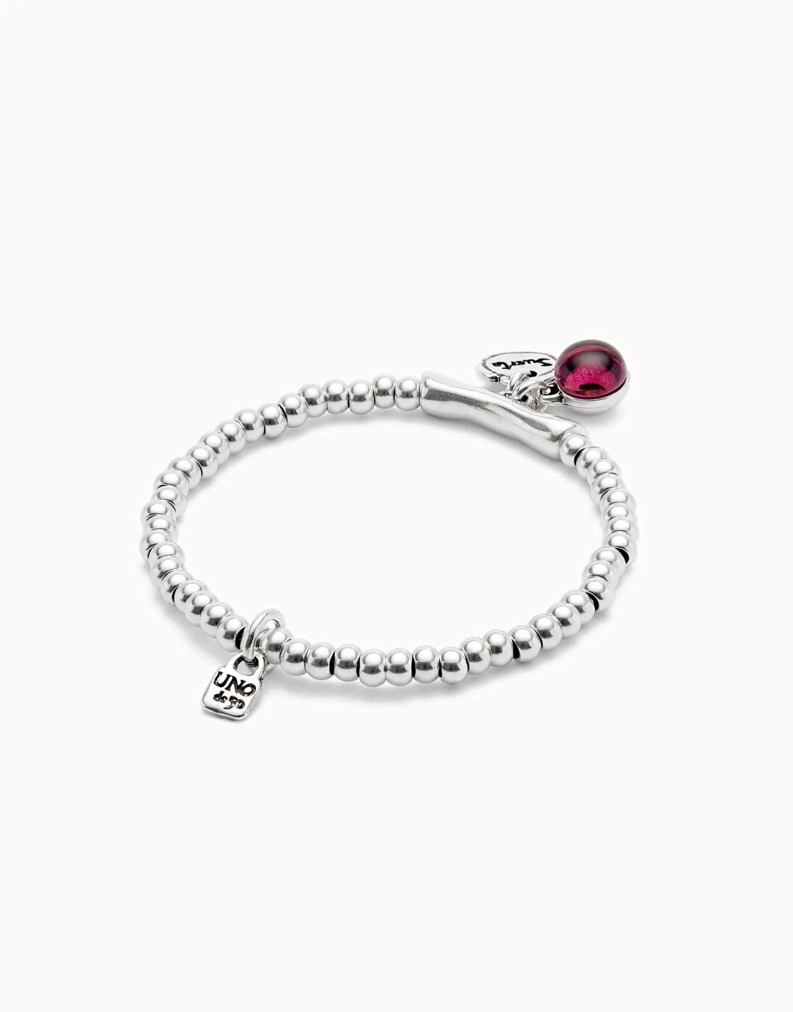 Beaded stretch bracelet with a murano glass and the word lucky