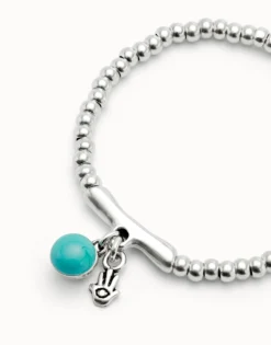 Beaded stretch bracelet with a murano glass and a hamsa
