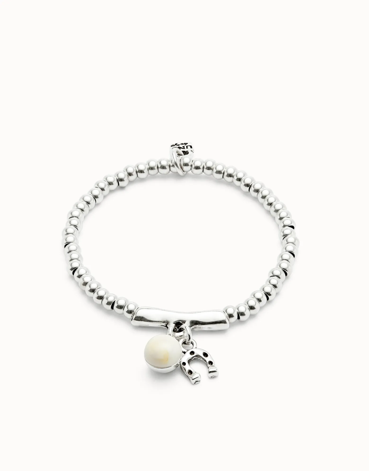 Beaded stretch bracelet with a murano glass and a horseshoe charm