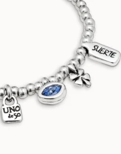 Beaded stretch bracelet with charms