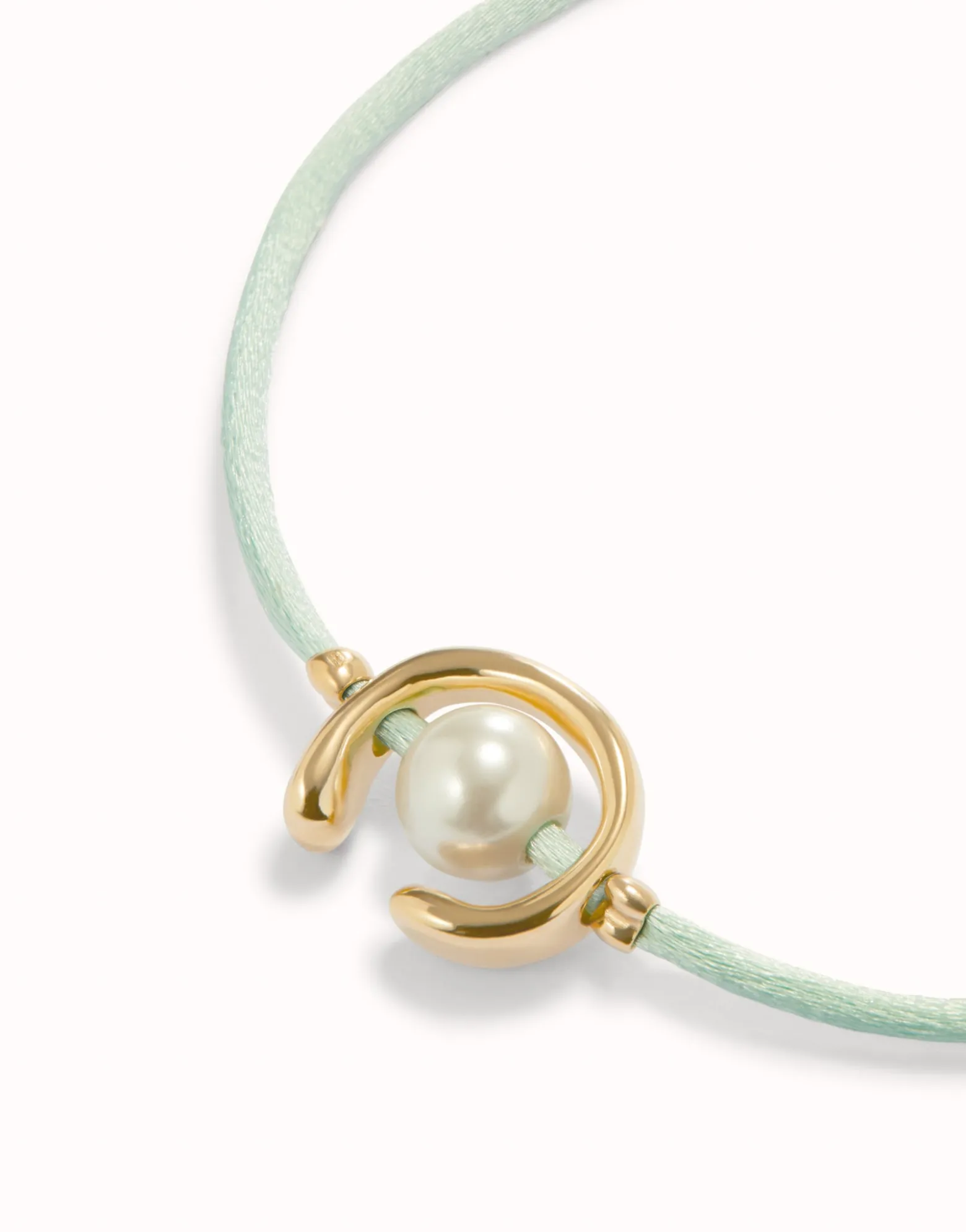 Blue green cord bracelet with a pearl