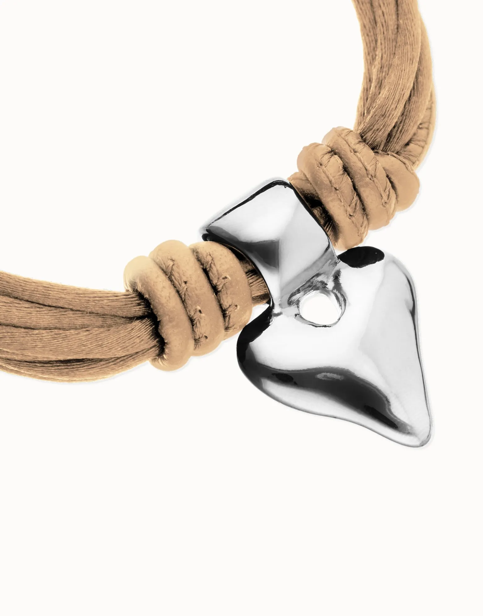 Bracelet in silk thread and camel leather with heart