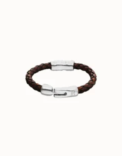 Brown braided leather bracelet with a metal detail