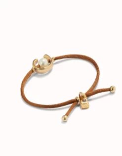 Brown cord bracelet with a pearl