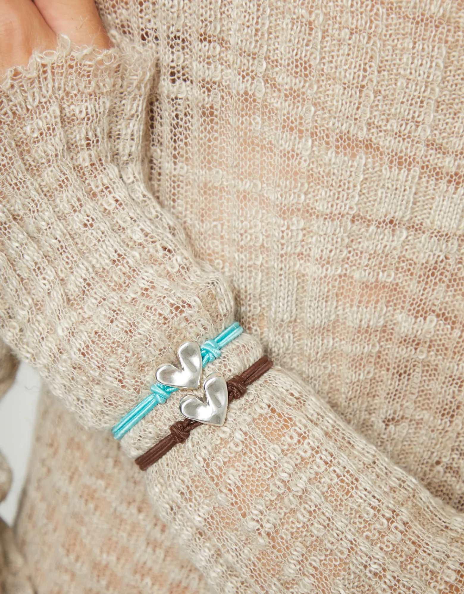 Brown elastic thread bracelet with heart