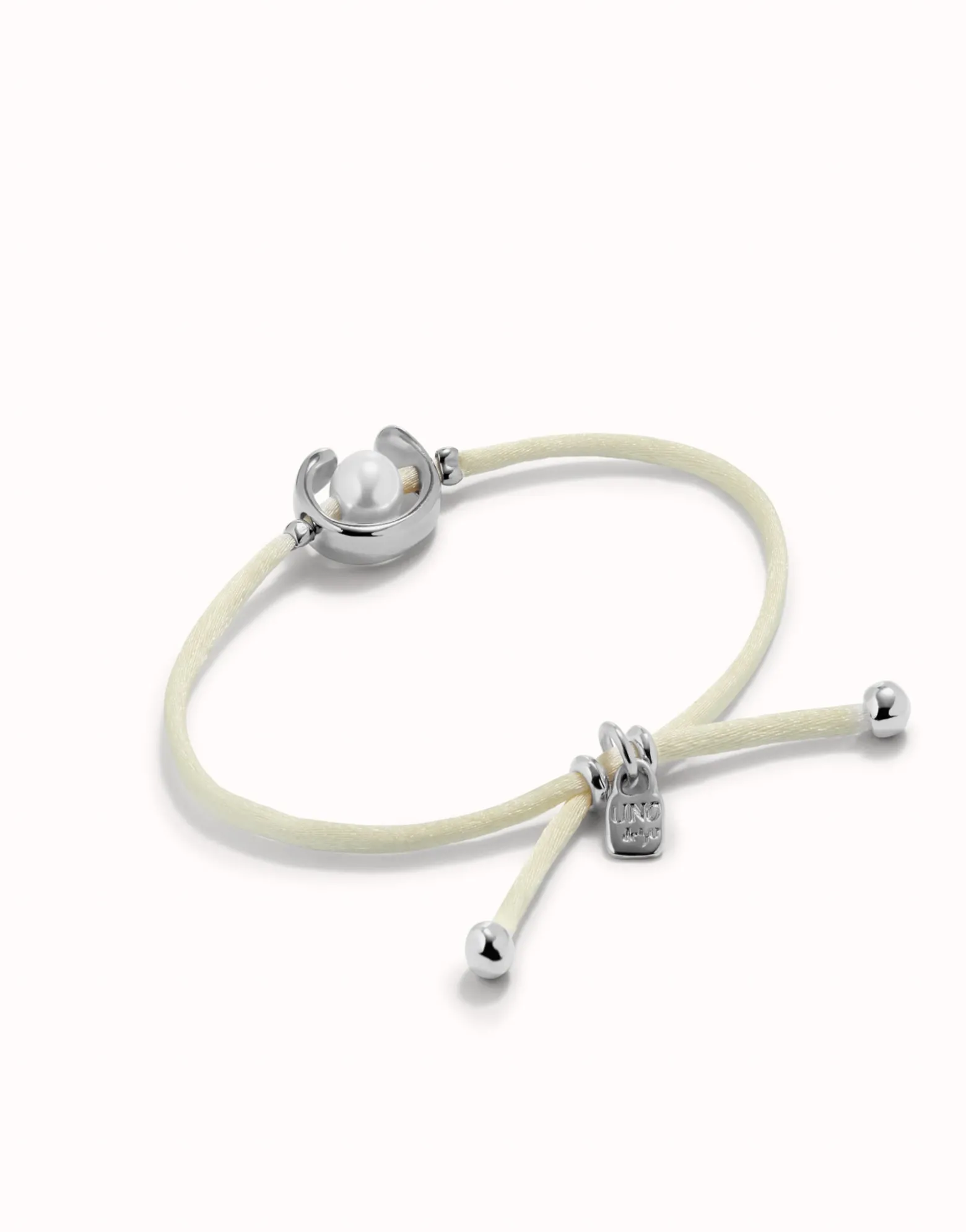 Cream cord bracelet with a pearl