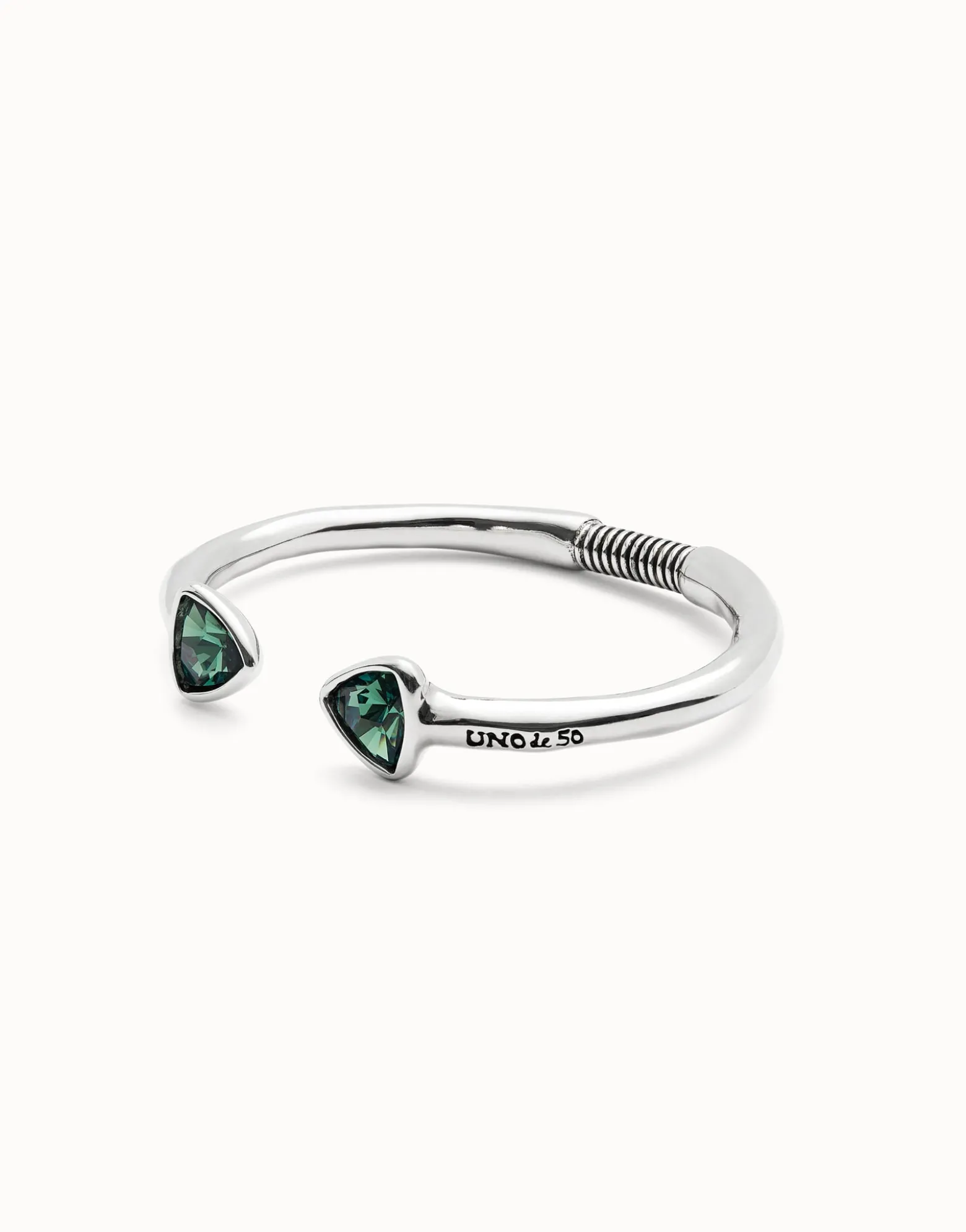 Cuff bracelet with two green crystals