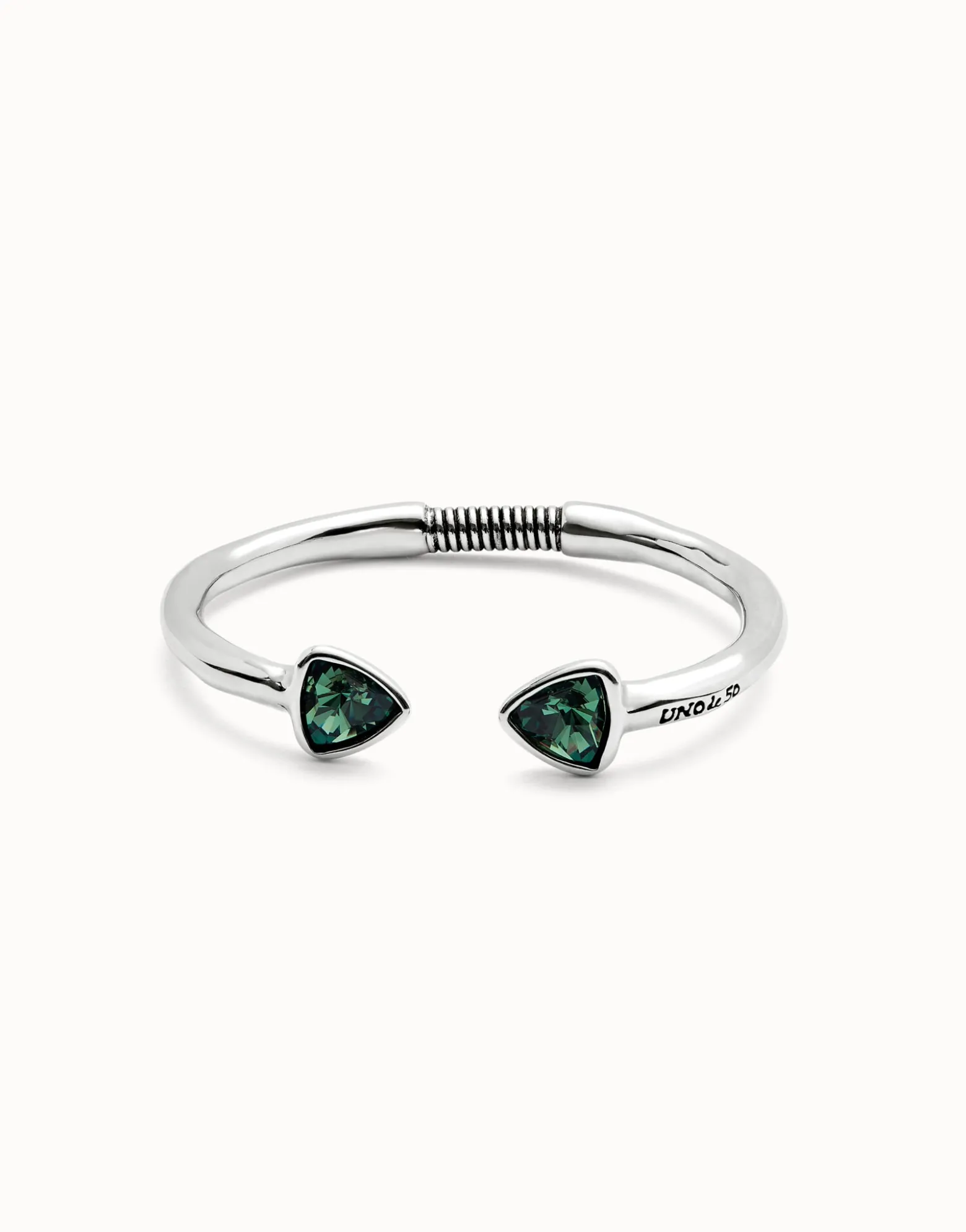 Cuff bracelet with two green crystals