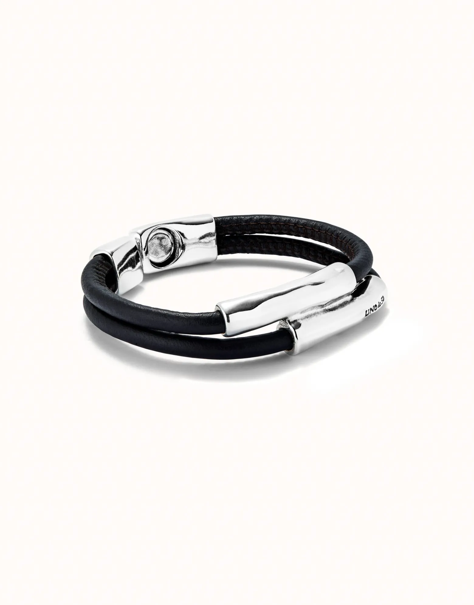 Double strand lether bracelet with two tubes