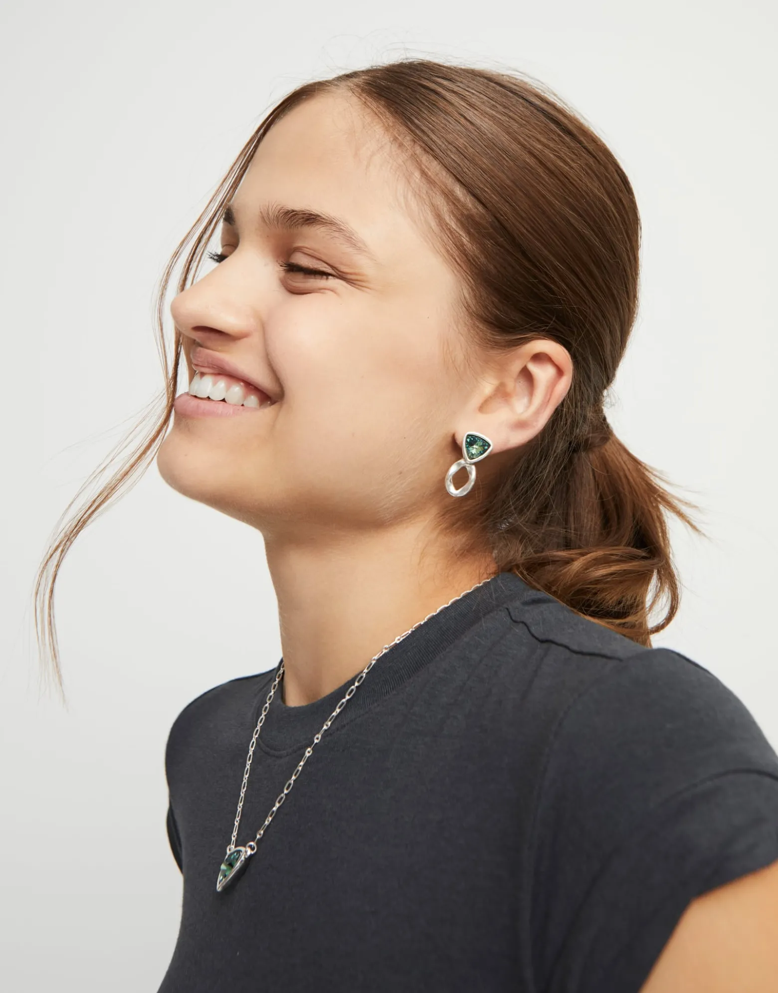 Drop earrings with green crystals