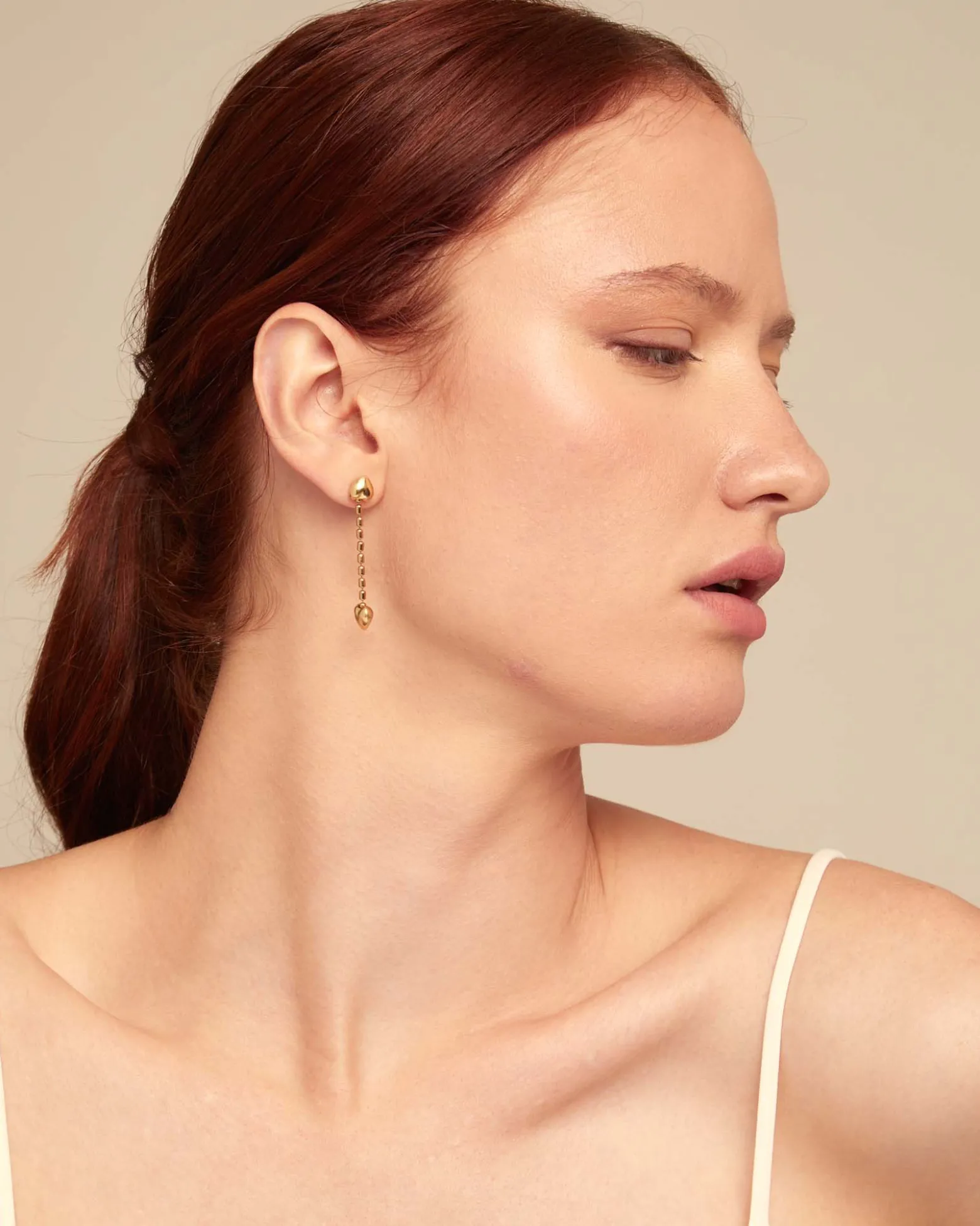 Drop earrings with small hearts
