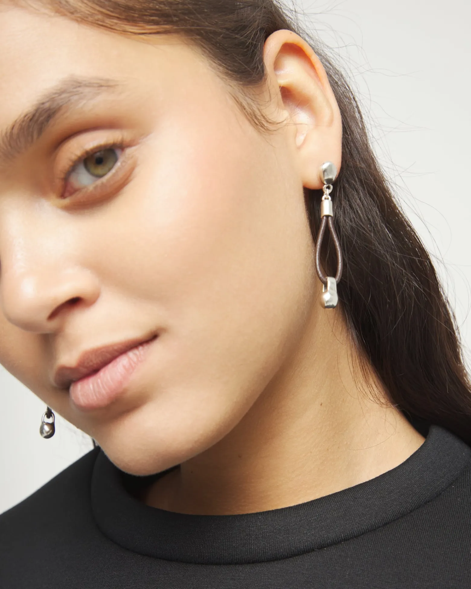 Drop leather earrings with sphere detail