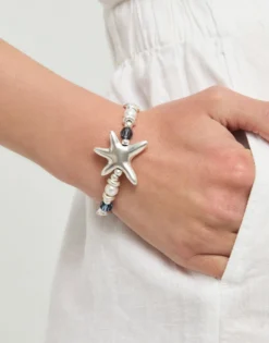Elastic bracelet with blue crystals and starfish
