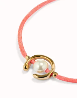Fuchsia cord bracelet with a pearl