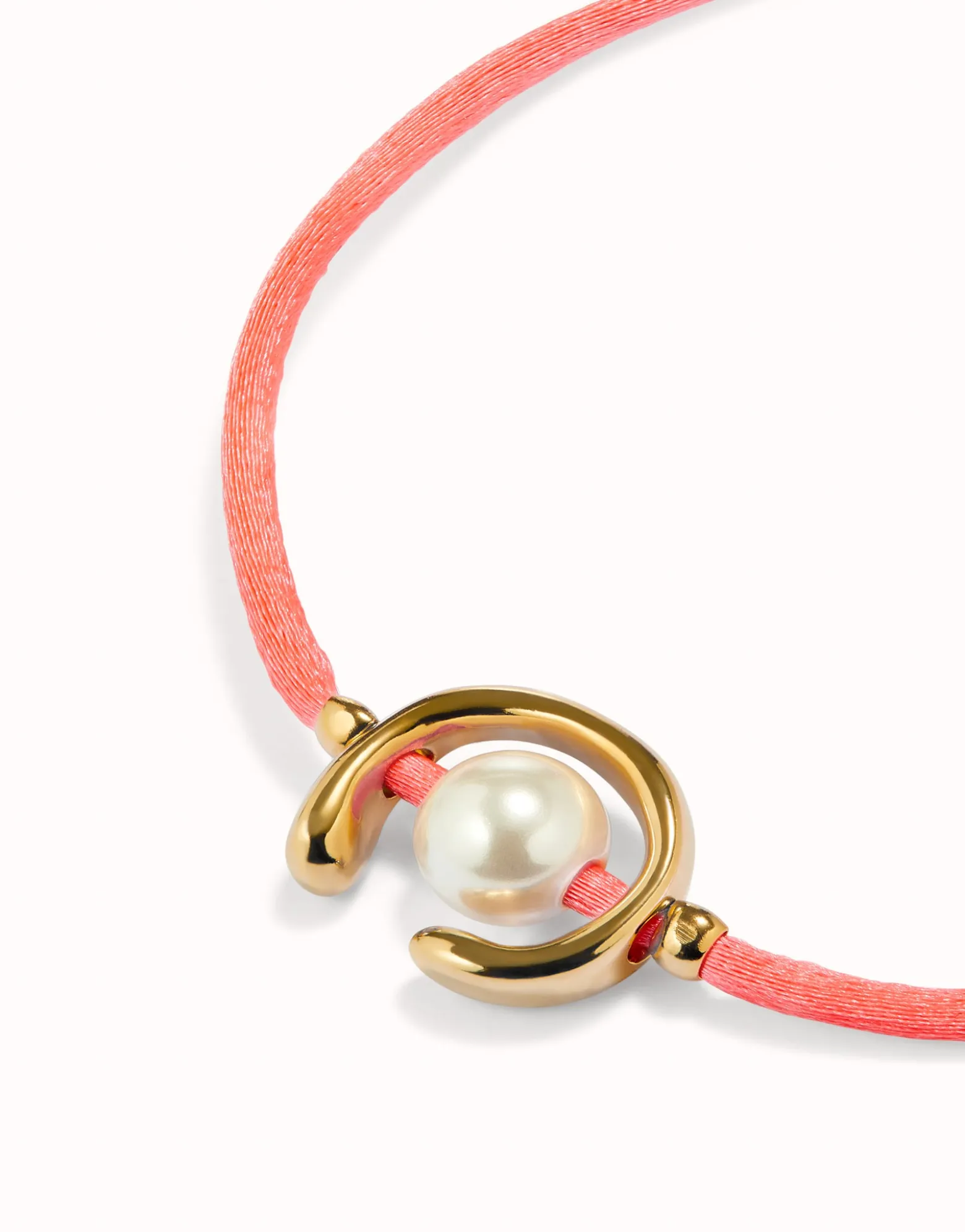 Fuchsia cord bracelet with a pearl