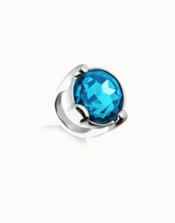 Large ring with blue oval faceted crystal