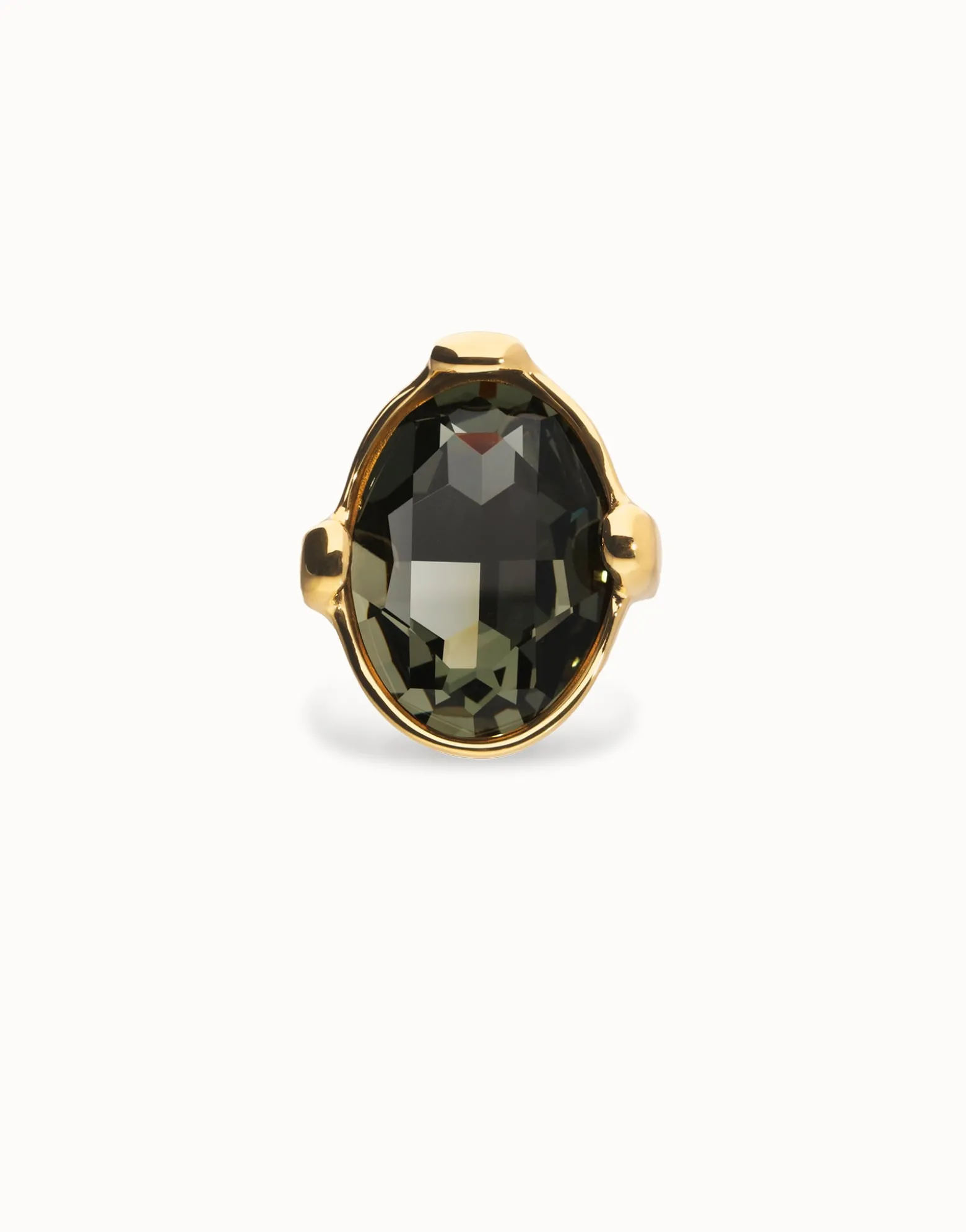 Large ring with oval faceted gray crystal