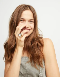 Large triangular ring with crystals