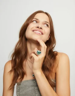 Large triangular ring with crystals