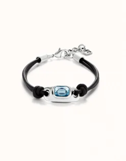 Leather bracelet with a blue crystal