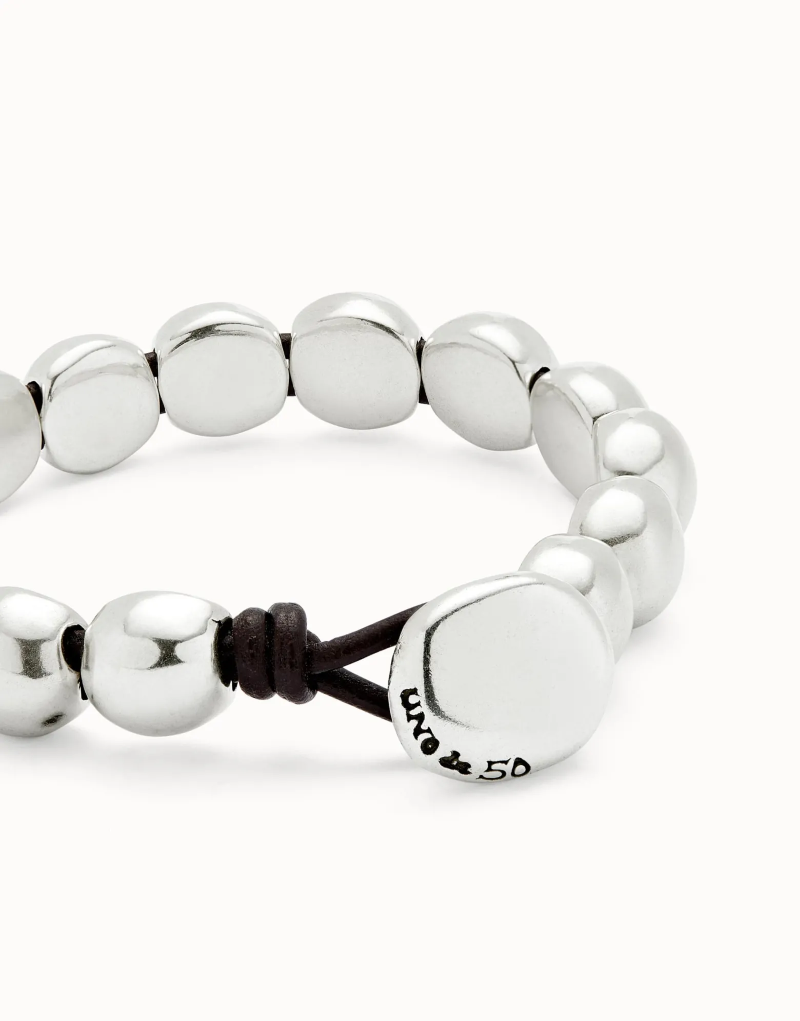 Leather bracelet with small round beads