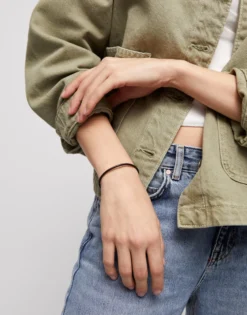 Leather charm bracelet with clasp