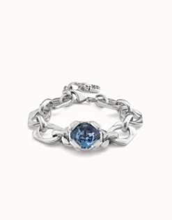 Link chain bracelet with a blue crystal
