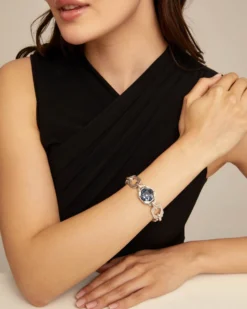 Link chain bracelet with a blue crystal