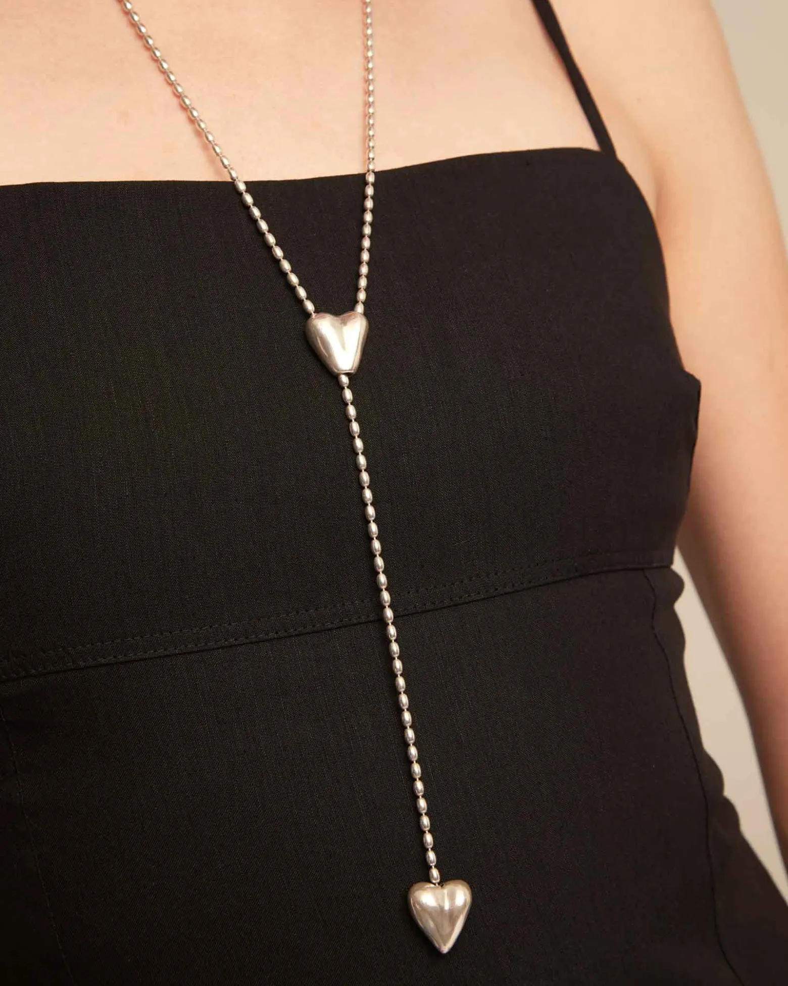 Long adjustable chain necklace with two hearts